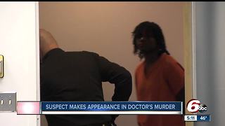 Suspect in doctor's murder makes first court appearance