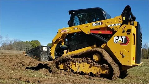 CAT 259D3 skid steer (CTL) loader work testing in wet, nasty clay dirt