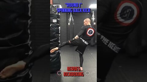 Heroes Training Center | Kickboxing & MMA "How To Throw A Round 1 & Spinning Back Kick" | #Shorts