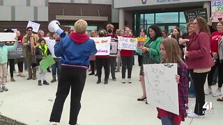 Community holds rally outside of Lawrence Public Schools ahead of budget meeting