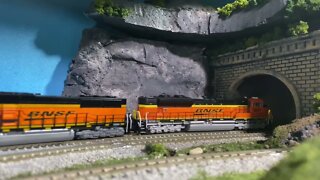 N Scale tank train meets a Steam excursion train