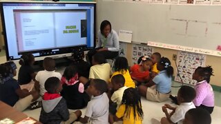 Rolling Green Elementary School teacher Patricia Michele teaches students in Creole