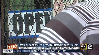 MTA bus hits pawnshop in NW Baltimore