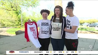 Local artist designs social distancing shirts