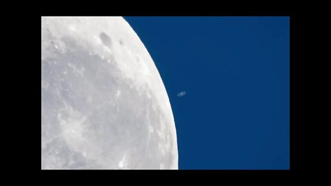 The moon passing in front of Planet Saturn