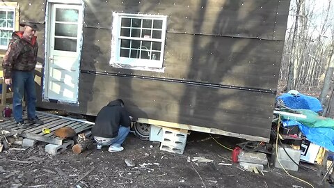 Working On Tiny House Siding With Tim From YouTube