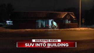 SUV slams into building on Woodward in Royal Oak
