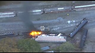 A train, reportedly transporting several thousand gallons of diesel fuel, has derailed causing fire