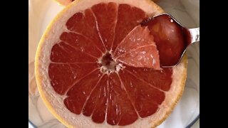 Enjoying a delicious grapefruit with the correct tool