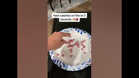 LADY TRIES TO HEAT SOME HAM IN A MICROWAVE AND IT SPARKS LIKE CRAZY BECAUSE OF THE METALS IN IT.