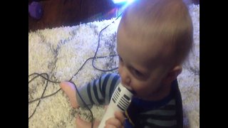 Baby's reaction to Microphone will have you Laughing!