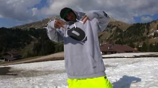 Snowboarder takes advantage of remaining snow in Italian Alps