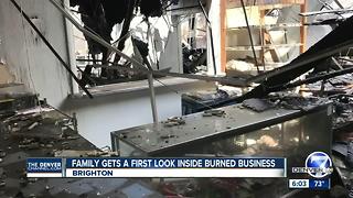 Family gets a first look inside burned businesses after Brighton fire