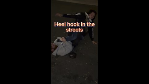 Heel hooked assaulter in street fight