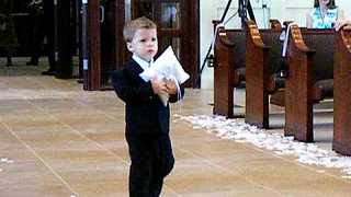 Cute Ring Bearer Takes His Precious Time And Slowly Walks Down The Aisle