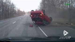 Car flips over after crashing into ditch