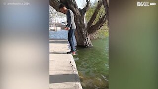 Guy dips toe in water during lightening-fast splash challenge