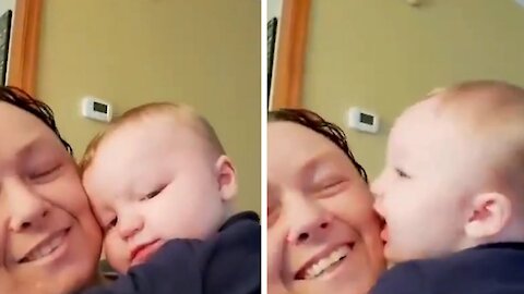 Little Baby gets a kiss from your mom, and in return kisses her face back