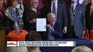 Gov. Rick Snyder signs bill for $175 million boost in road spending