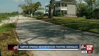 Neighbors in Tarpon Springs fight sidewalk construction