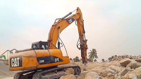 Excavator With Hydraulic Hammer Breaking Rock CAT 320D - Stone Breaking Works