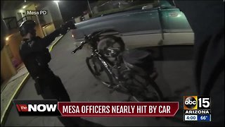 Mesa officers nearly run over