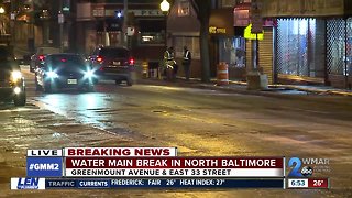 Water main break causes slick conditions in Charles Village