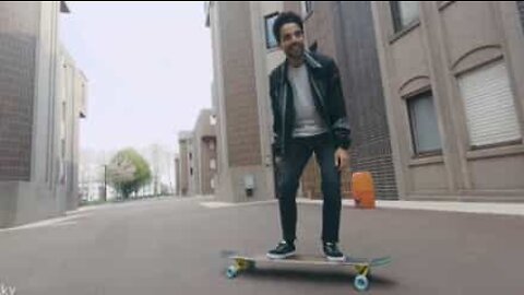 Amazing dance moves on longboard shot by drone