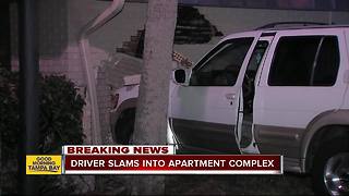 Eight residents displaced after SUV crashes into Tampa apartment complex