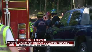 Officials rescue man trapped in collapsed trench