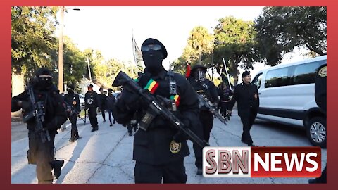 Black Panthers Lead Armed March Outside Ahmaud Arbrey Trial - 5208