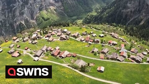 First-time paraglider captures STUNNING footage of historic Swiss village