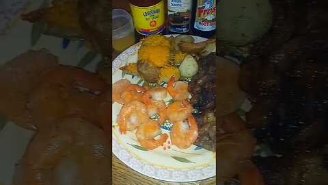 Ribeye with sauteed Onions garlic, Mushrooms, roasted herbs n potatoes with cheddar cheese, Shrimp