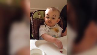 Funny Tot Boy Has A Mustache And Eyebrows Drawn On His Face