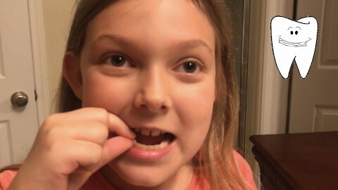 GraceKat Pulls Out Her Own Tooth