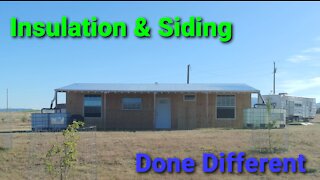 Insulation & Siding on our Shipping Container Cabin
