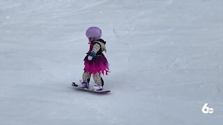 Local four-year-old goes viral for her snowboarding skills in princess dresses