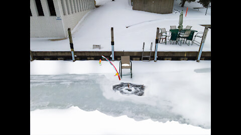 Snowmobiles on the Black river winter to spring transition.