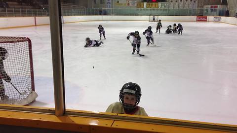 Toddler completely ignores hockey game - needs to use washroom!