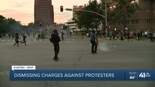 Dismissing charges against protesters