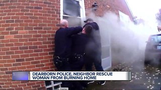 Video shows Dearborn officers rescue unconscious woman from burning home