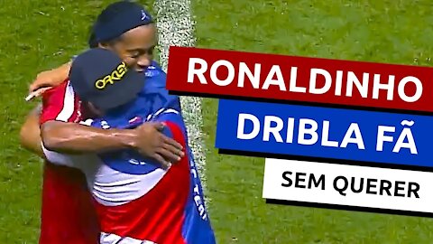 Ronaldinho "dribbles" fan by accident