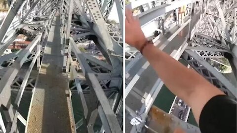 Man running over the bridge which is scary