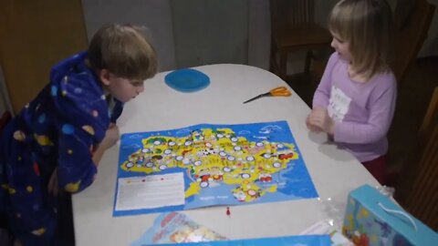 Eddie and Zoriana playing a board game