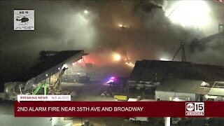 Second-alarm scrap metal fire burning near 35th Ave and Broadway