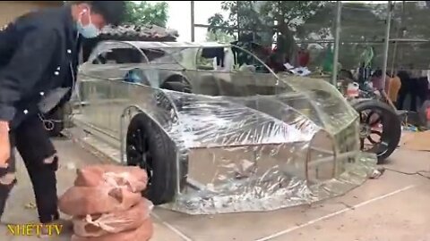 Guys creating a replica of a Bugatti