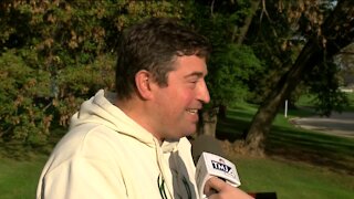 Bucks president Peter Feigin shows off championship ring