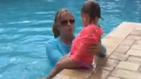 Baby falls into pool and back floats on her own!