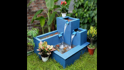 My father makes the blue aquarium for the garden corner