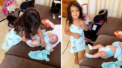 Big Sister Adorably Changes Newborn Baby's Diaper
